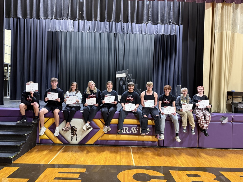 Picture of 10 students holding Outstanding Performer Awards
