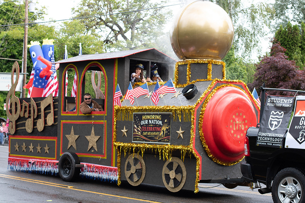 Hazel Dell Parade of Bands float, a replica train with a sign that reads, "Honoring Our Nation, Celebrating Our Heroes"