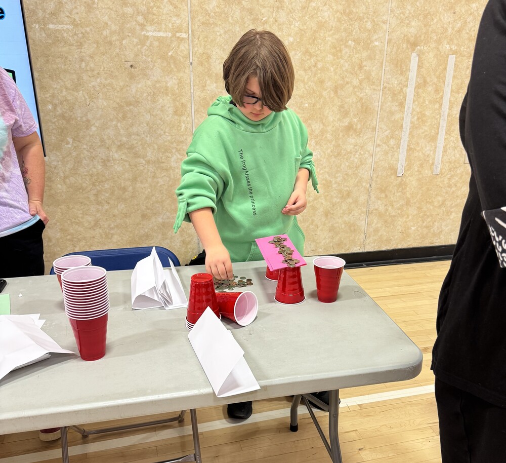 student works on a STEAM activity