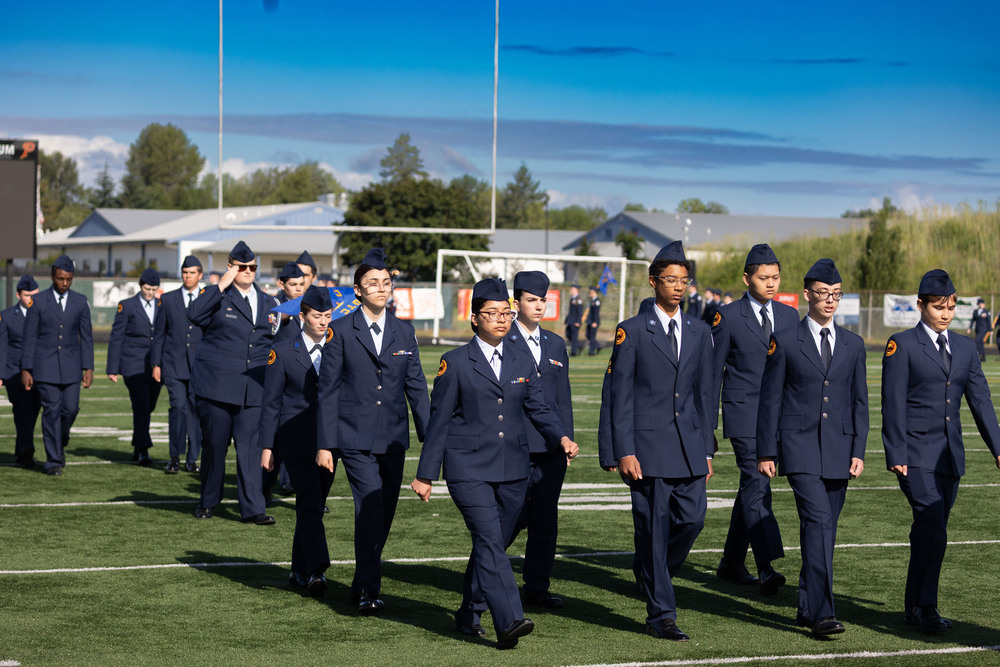 Students march in the Pass-in-Review