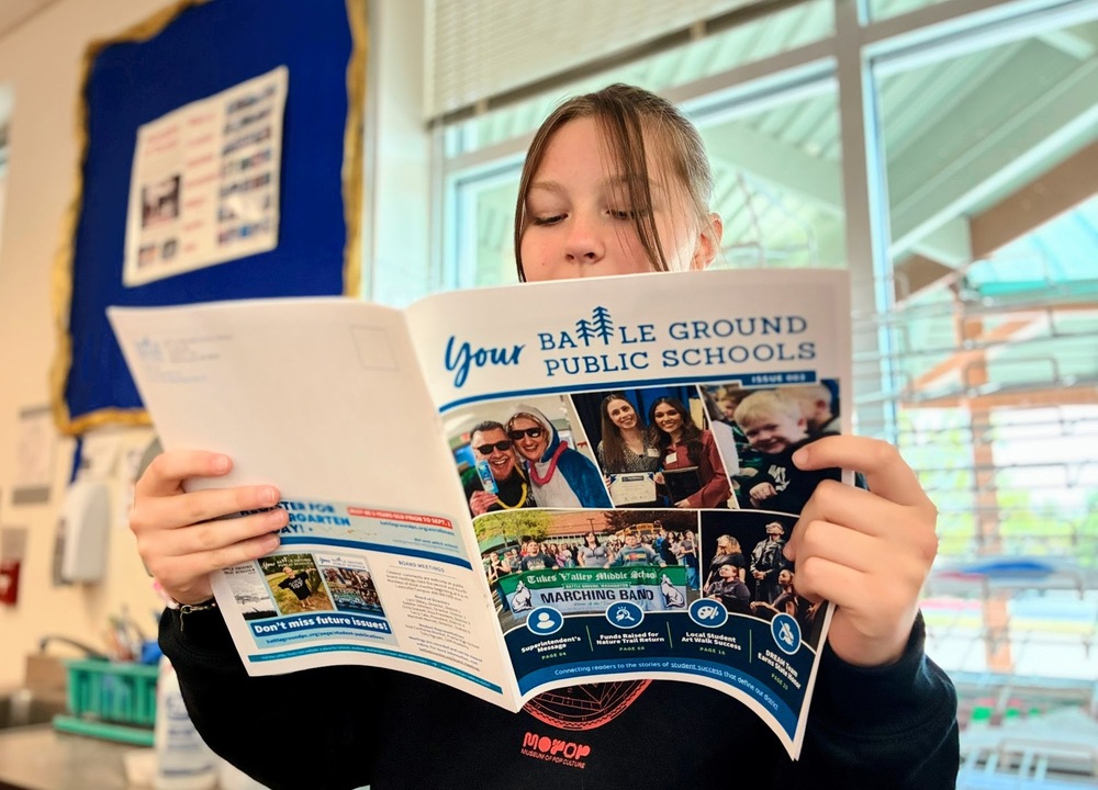 Student reads the latest issue