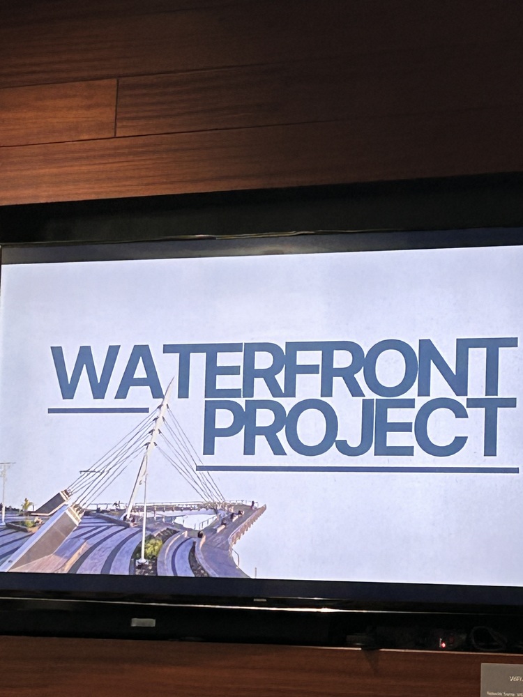 Screen with the words "Waterfront project"