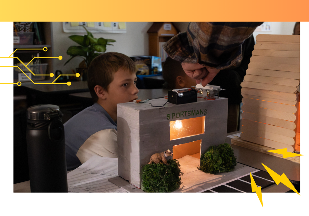 A child demonstrates his electricity project