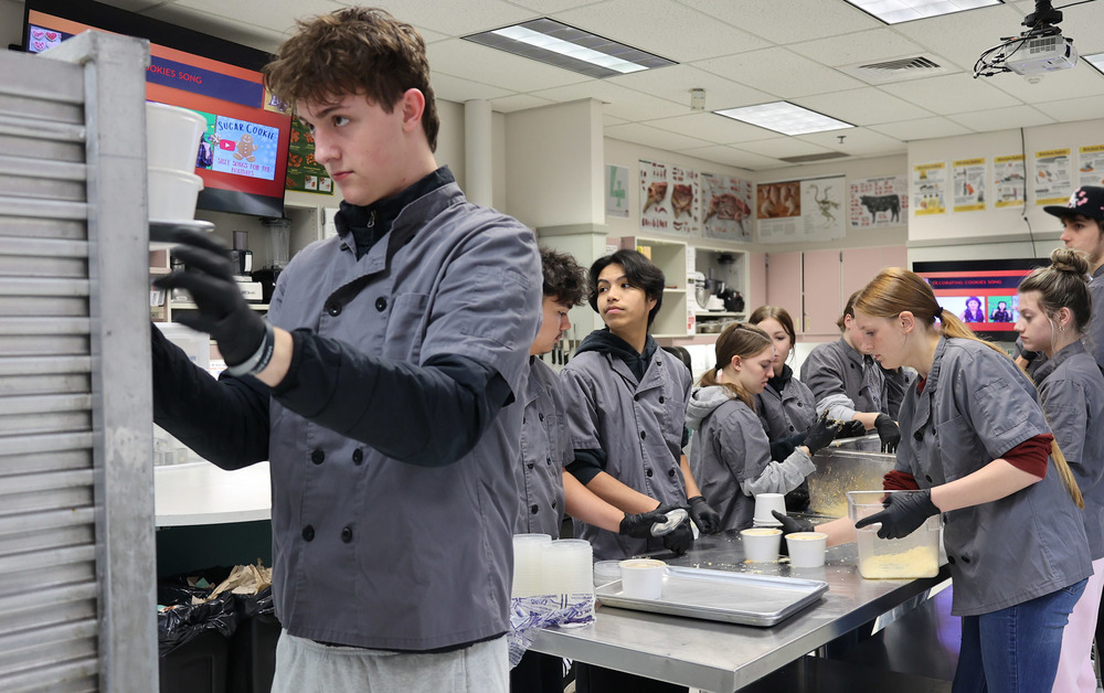 culinary students prepare dishes