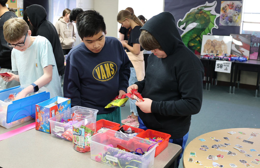 Students browse items in the school's Patriot Store.