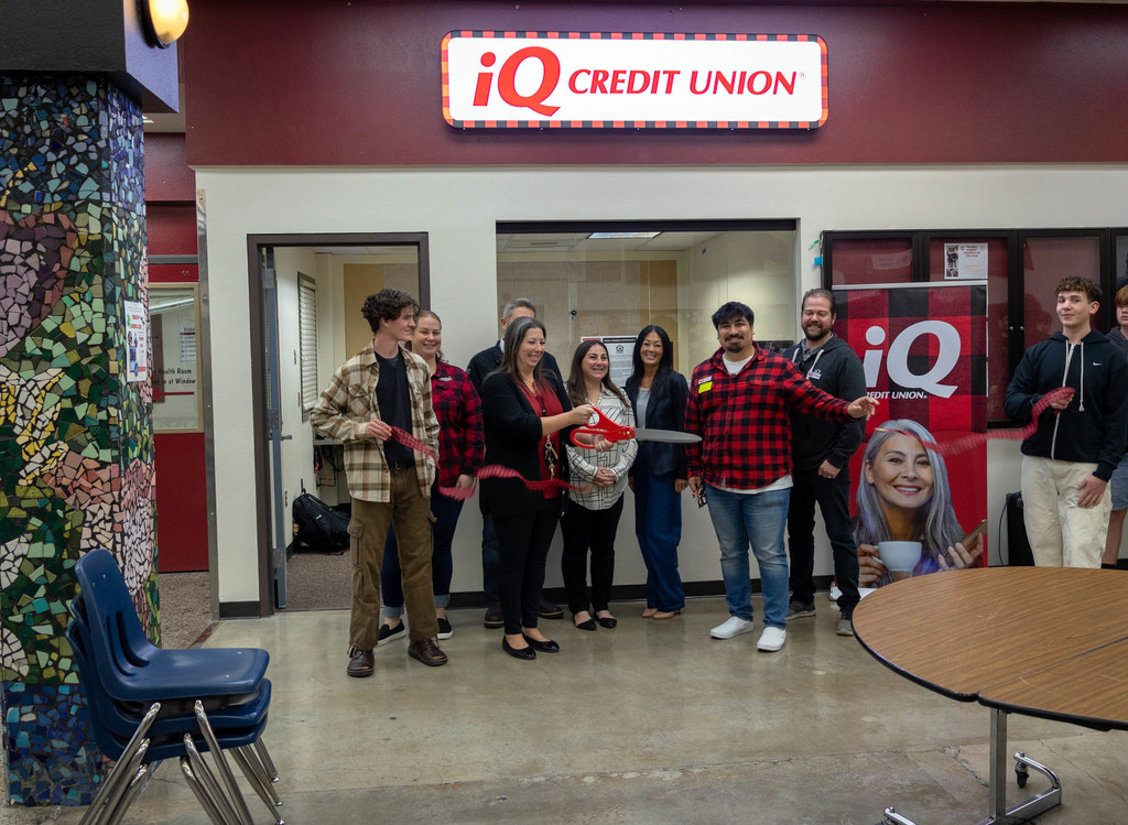Celebrating the ribbon cutting of a new student-run credit union branch