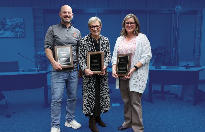 Outgoing directors Ted Champine, Mary Snitily and Jackie Maddux