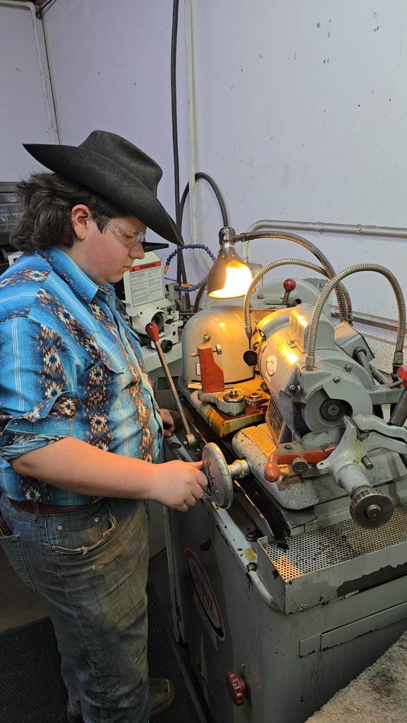A student works on a machine