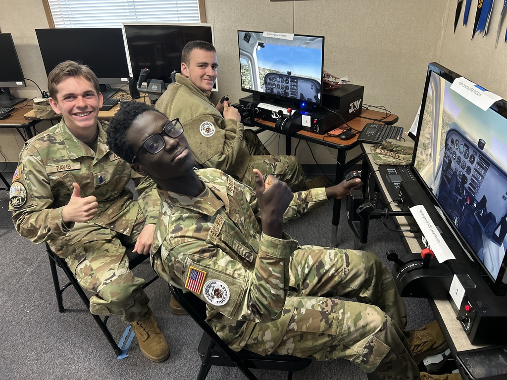 AFJROTC students give the camera a thumbs up.