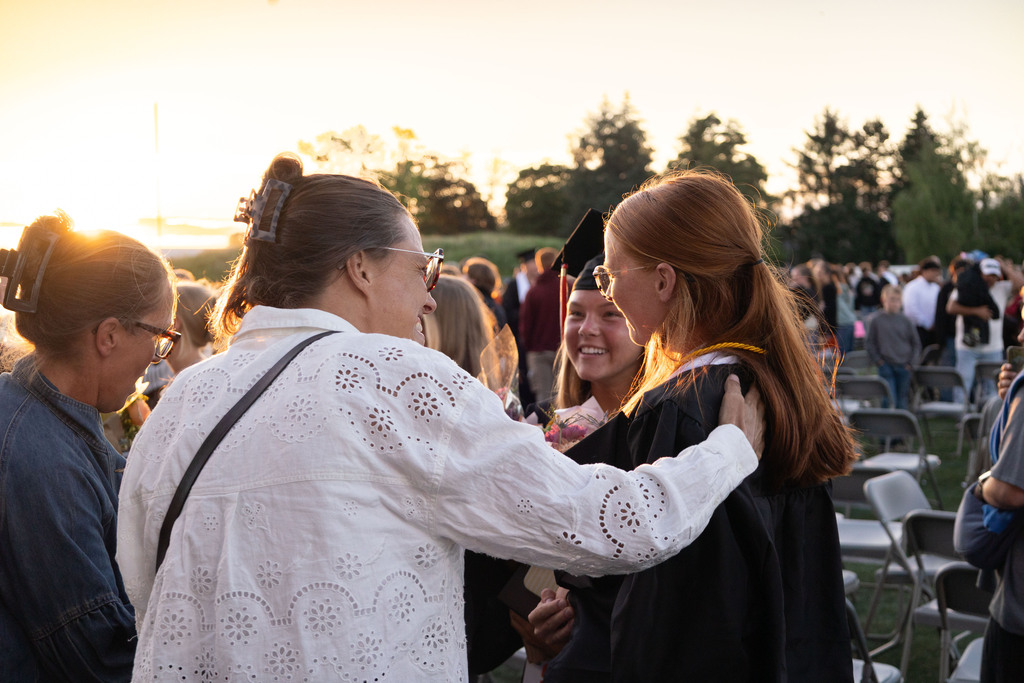 young family celebrating graduation