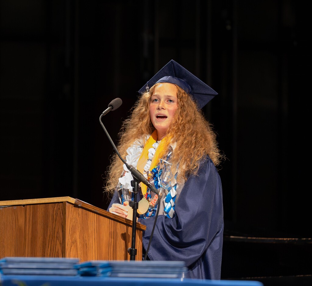 Valedictorian speaks at the podium