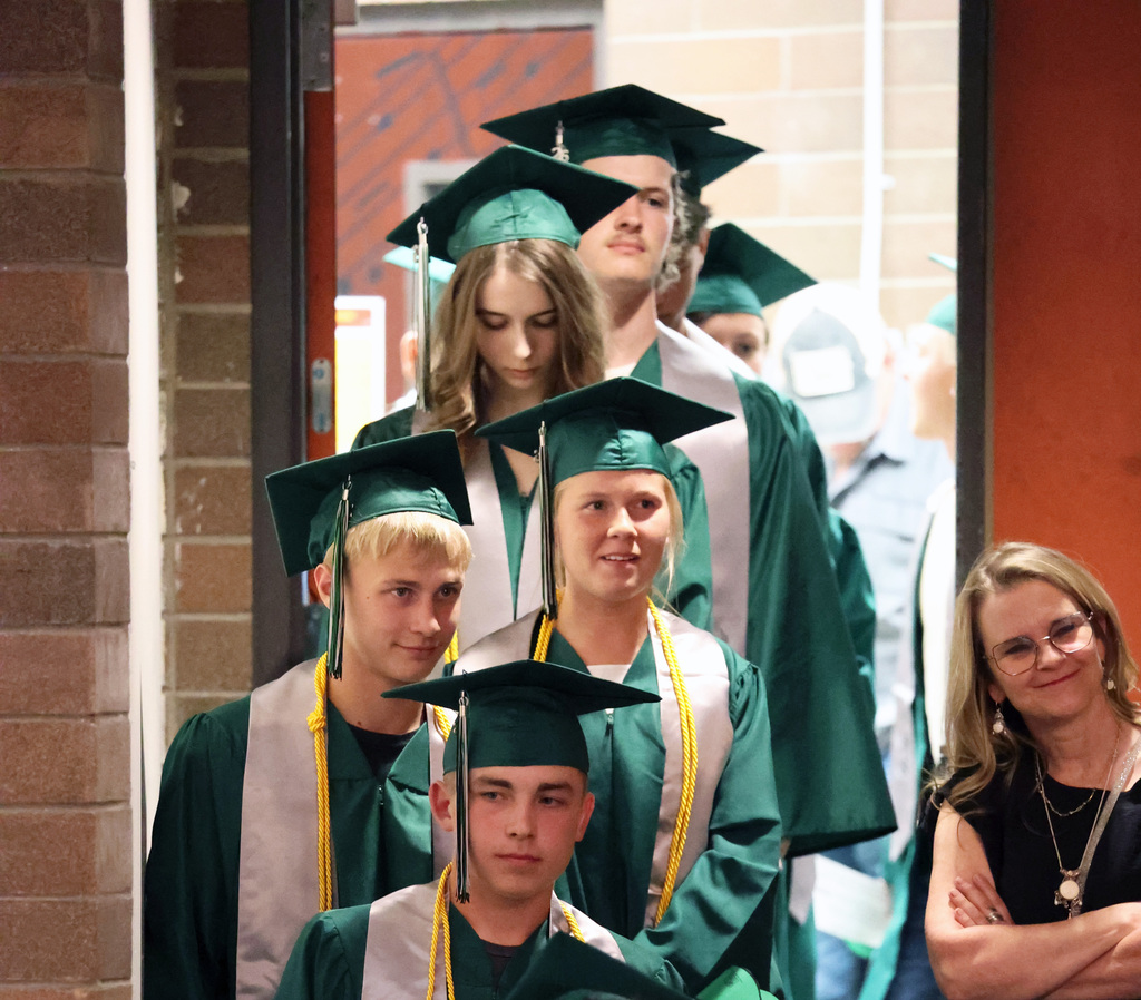 Graduates await their turn to cross the stage.