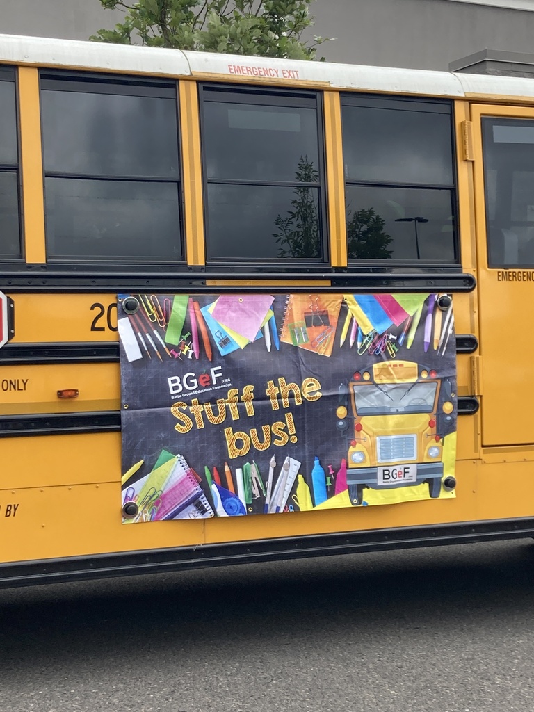 A bus waiting to be filled with donated school supplies