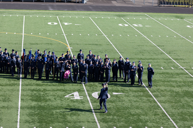 2026 pass in review students pose for a photo
