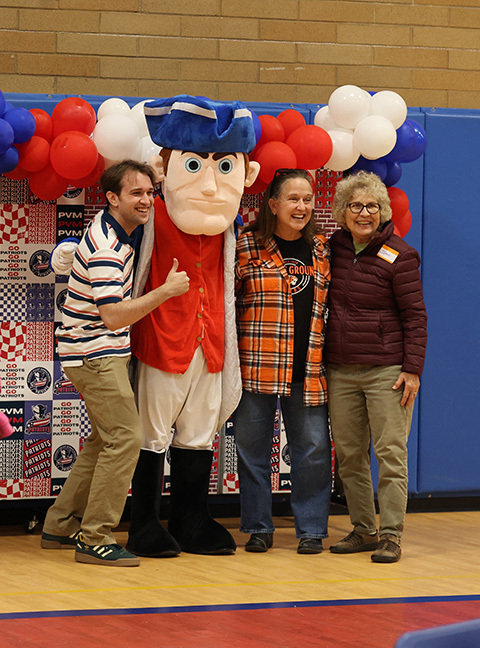 Attendees pose for a photo