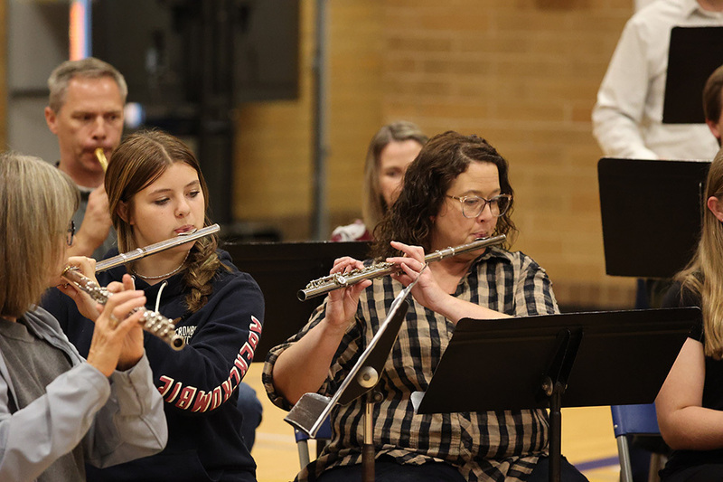 An alumni band plays a song