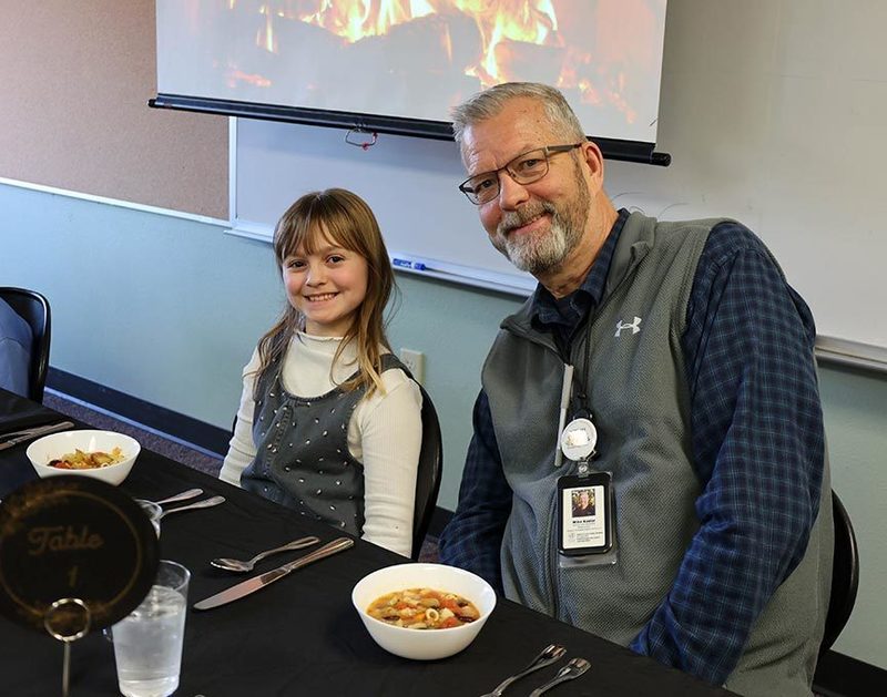 a student smiles for the camera