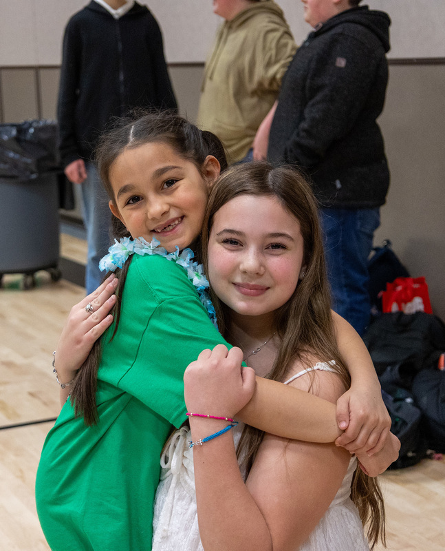 an older and younger student bonding