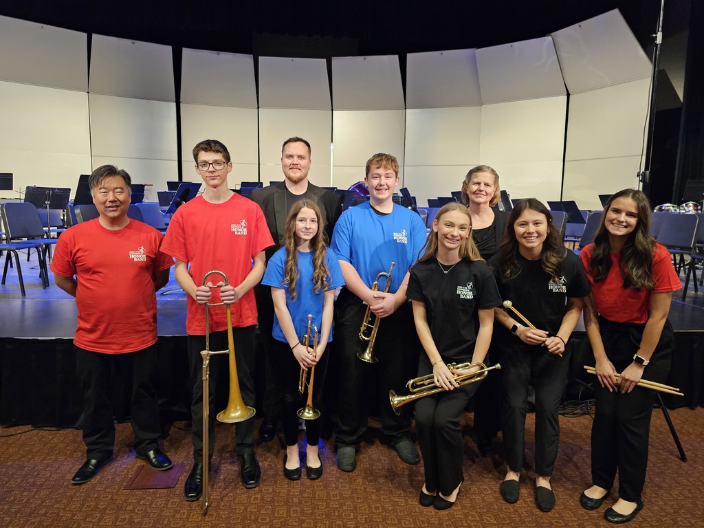 Image of students who participated in the honor band with the directors of each level!