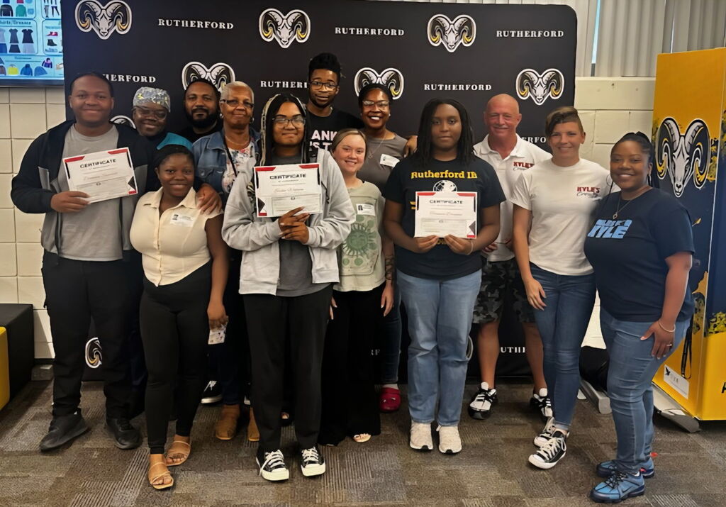 Group photo with the Miles for Kyle Scholarship recipients and family members
