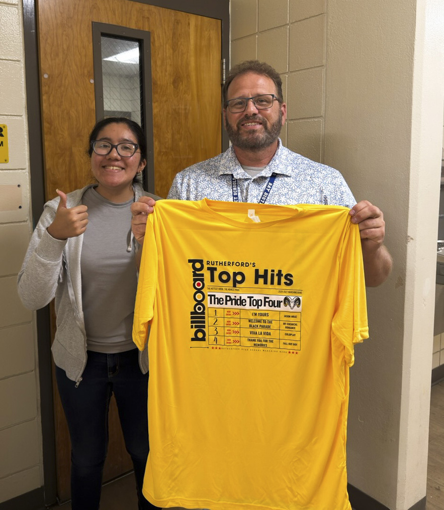 Mr. Westall poses with his new shirt from The Pride