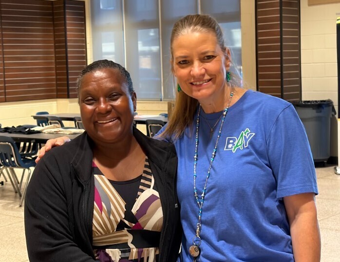 Title I Parent Liaison and Title I District personnel support the All Pro Dad meeting which promotes parent engagement