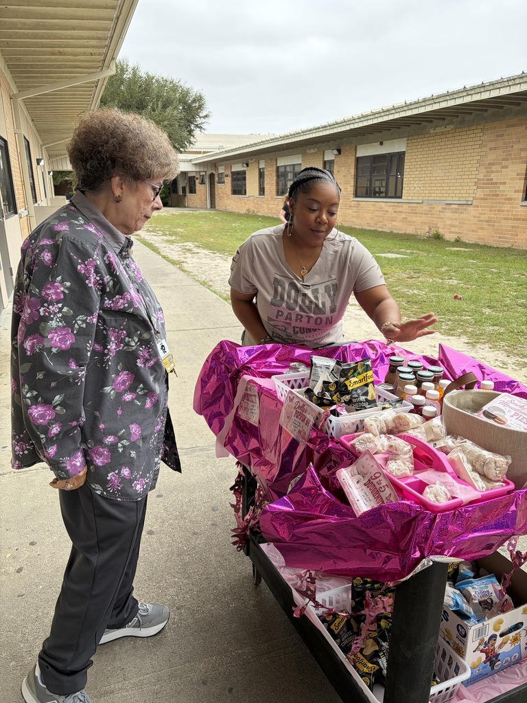 Ms. Myatt chats with a teacher
