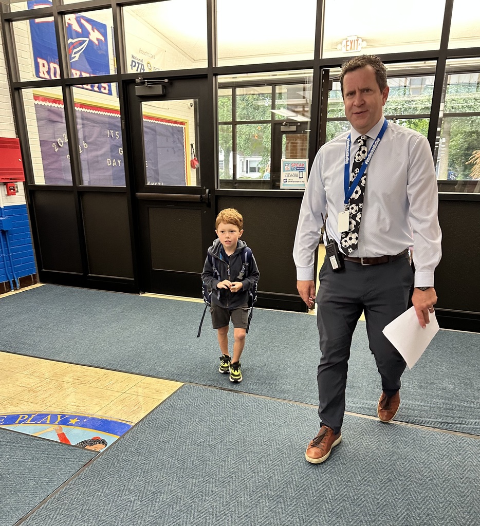 Normandy principal dan sebring welcomes a kindergarten student to the building in august 2025