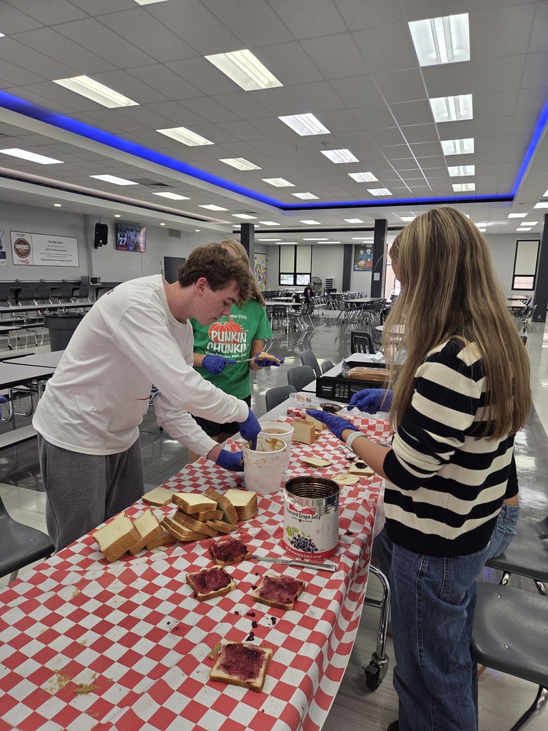 Key Club Members prepare PB & J sandwiches for the Cleveland homeless. 