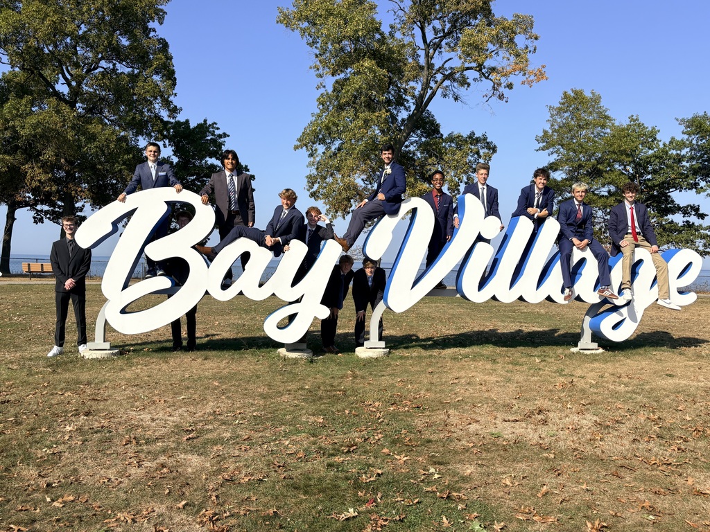 Junior Boys Soccer Team at Bay Village sign for Homecoming 2025 photo