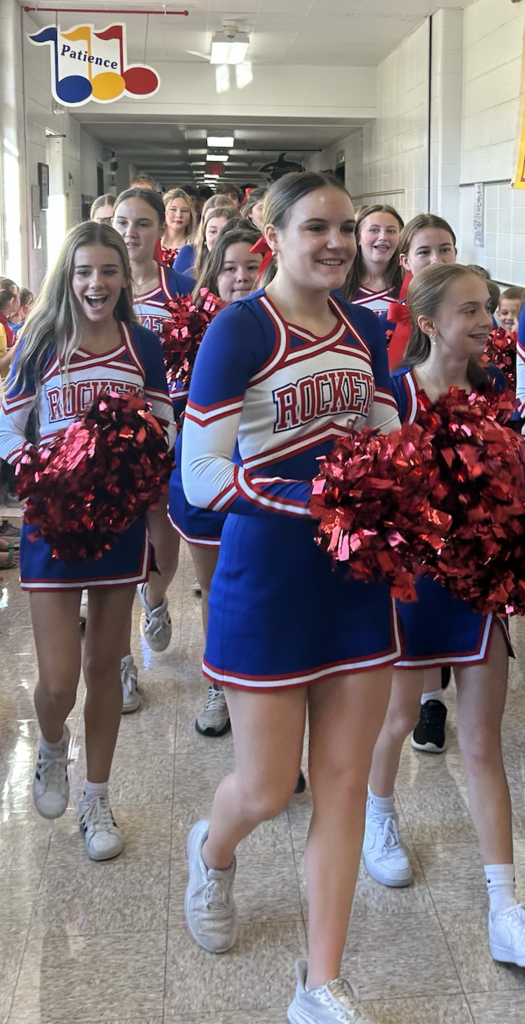 cheer team visits school buildings during homecoming week 2025