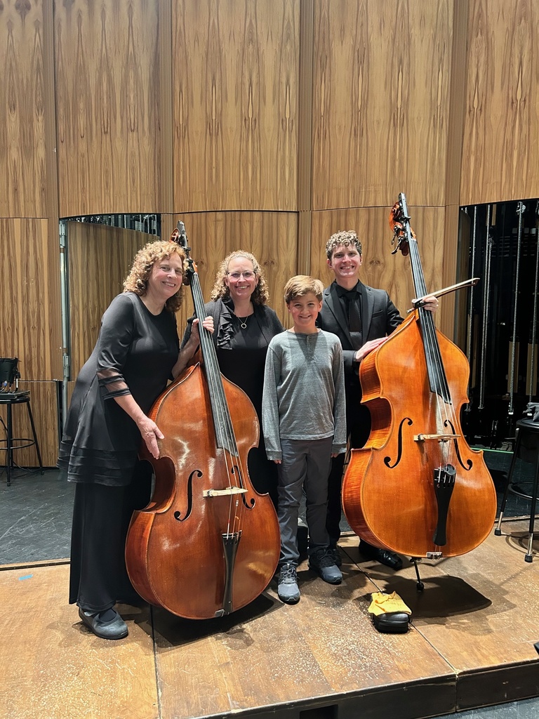BMS Student with three instructors at Akron Symphony Concert Oct. 2025