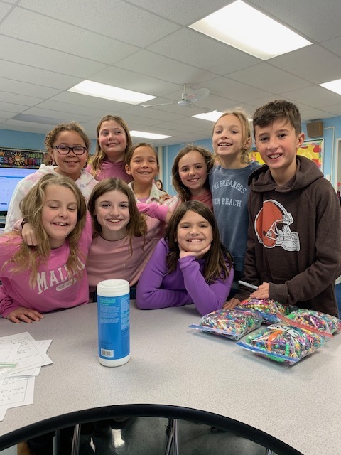 Nolan Cavalier and his fourth-grade classmates made keychains to raise funds for Jamaica