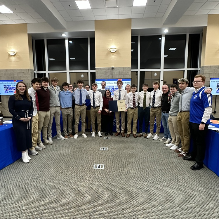 rep Bride Sweeney with boys state runners-up soccer team