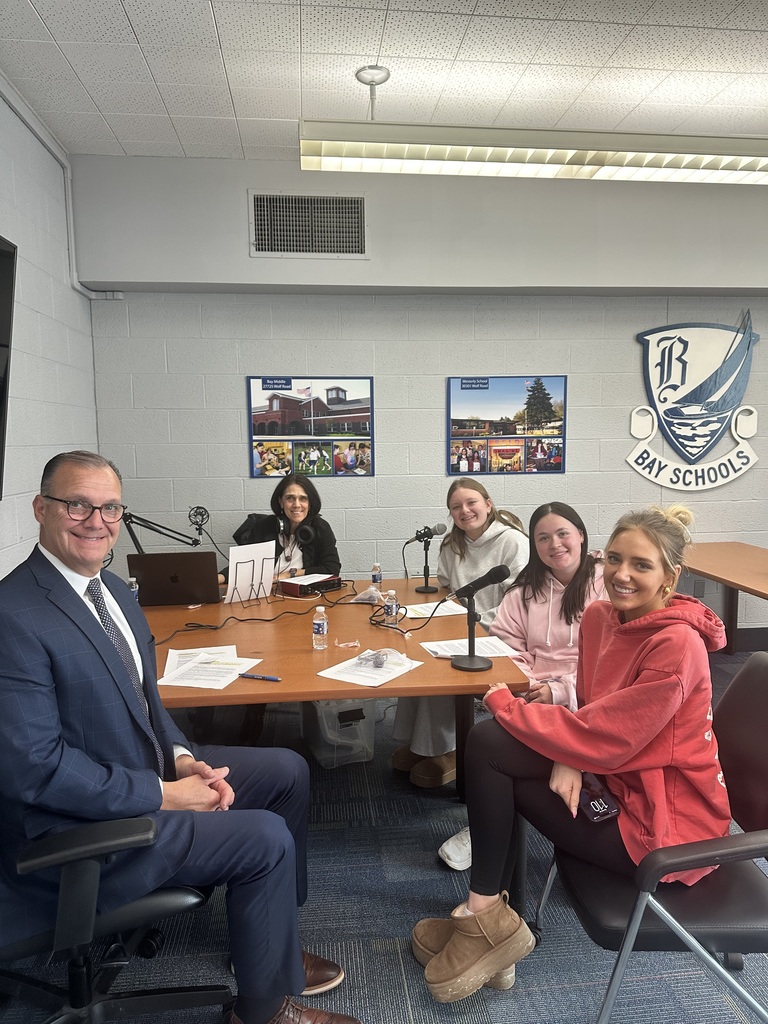 Podcast photo from episode #11 featuring Team It Takes A Village, comprised of BHS students