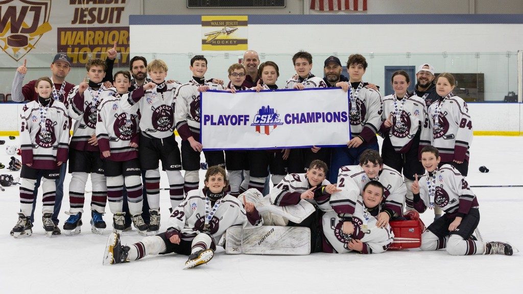 two bms students are part of championship hockey team photo
