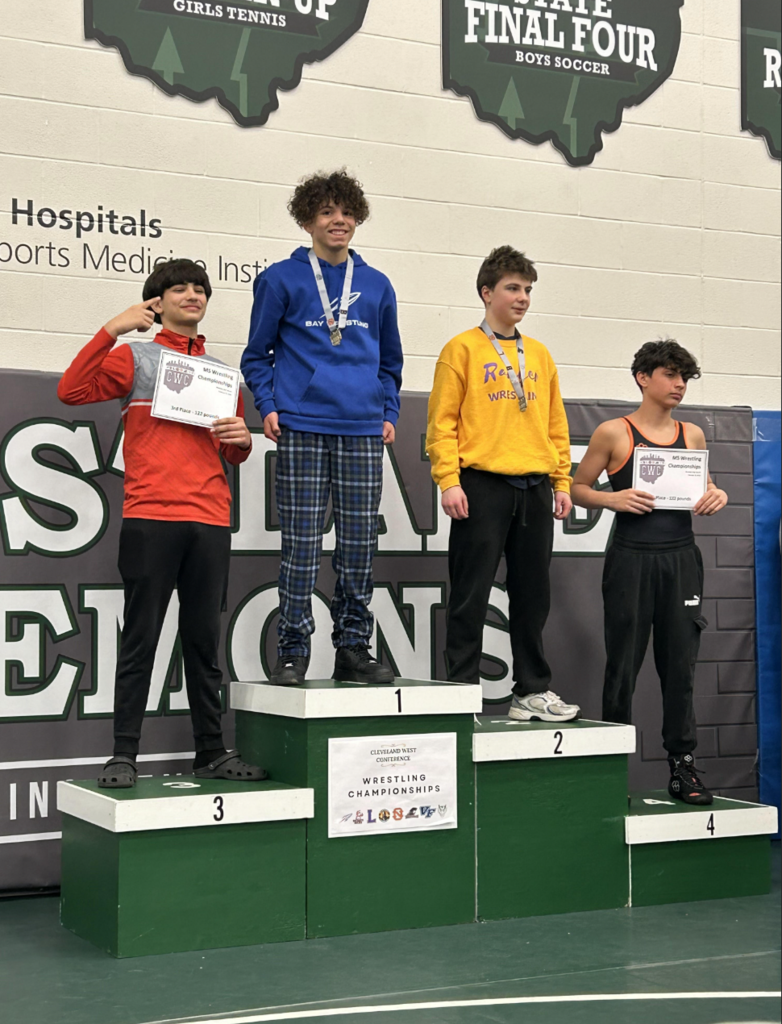 Aden Davis @ 122 lbs conference winner for bay middle school photo
