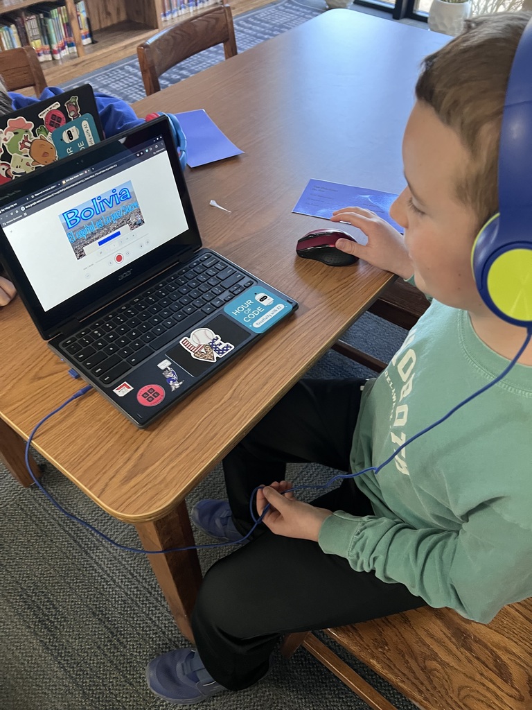 a westerly fourth-grader works on his spanish project about bolivia