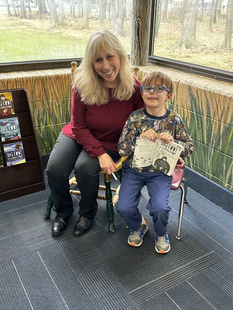 big foot little foot author ellen potter meets a normandy elementary school student during a book signing event