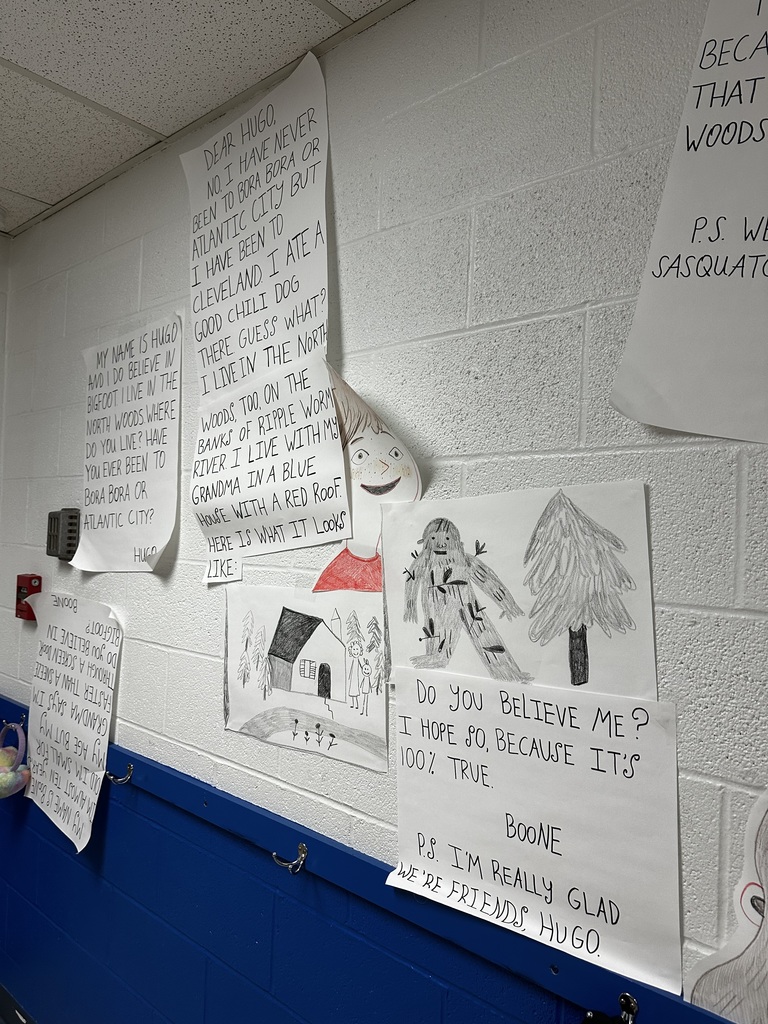 one school one book stories hanging on the wall about big foot little foot by ellen potter