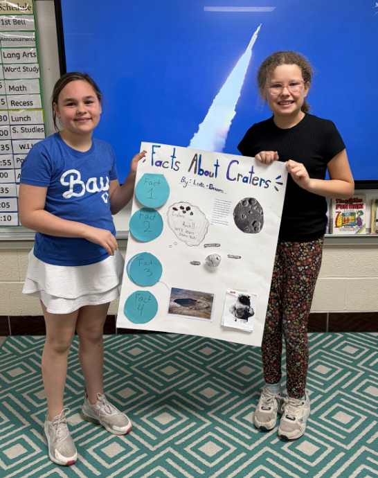 third-graders in mrs. thomas' class watch the launch of artemis 2 as part of their science studies