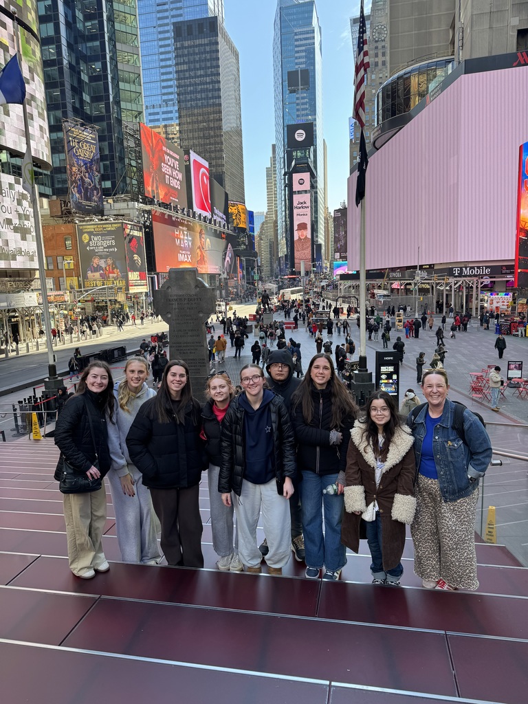 bay high school model un participates in a competition in new york city with times square in the background march 2026