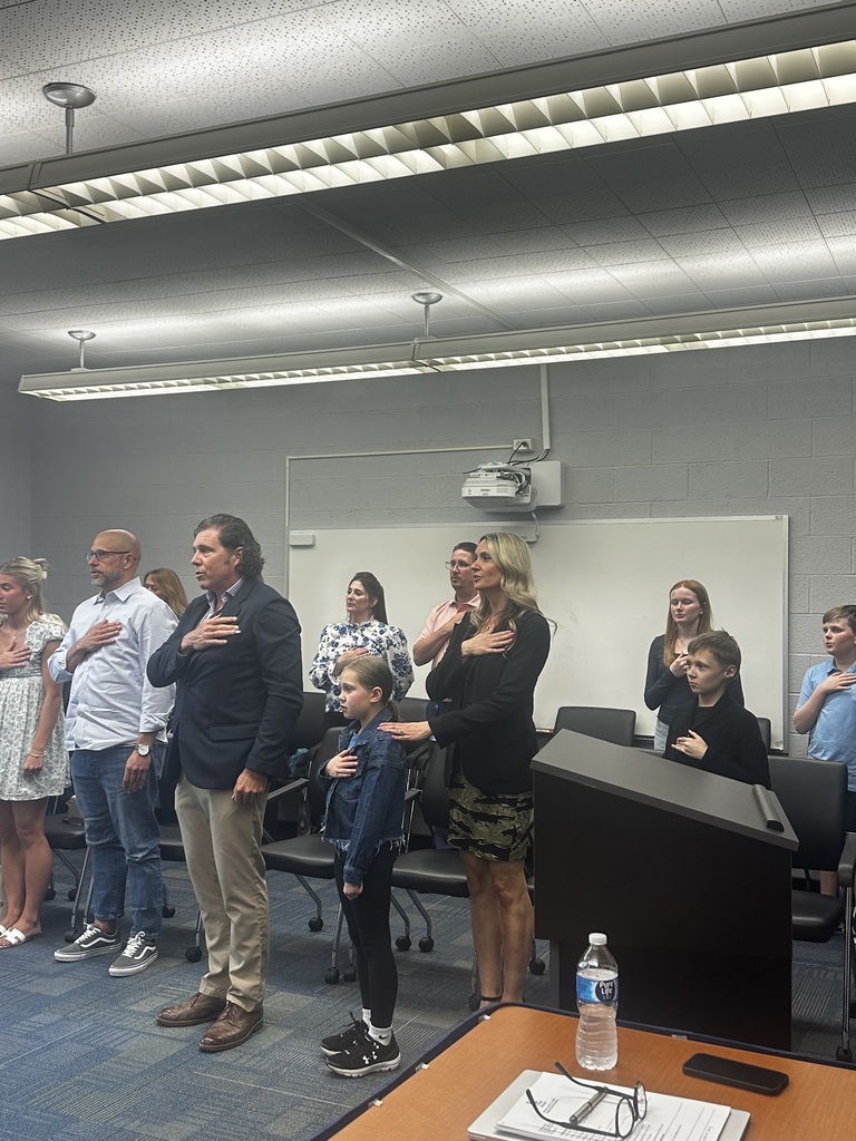 curtiss family recites the pledge of allegiance at a board of education meeting for month of the military child in april 2026