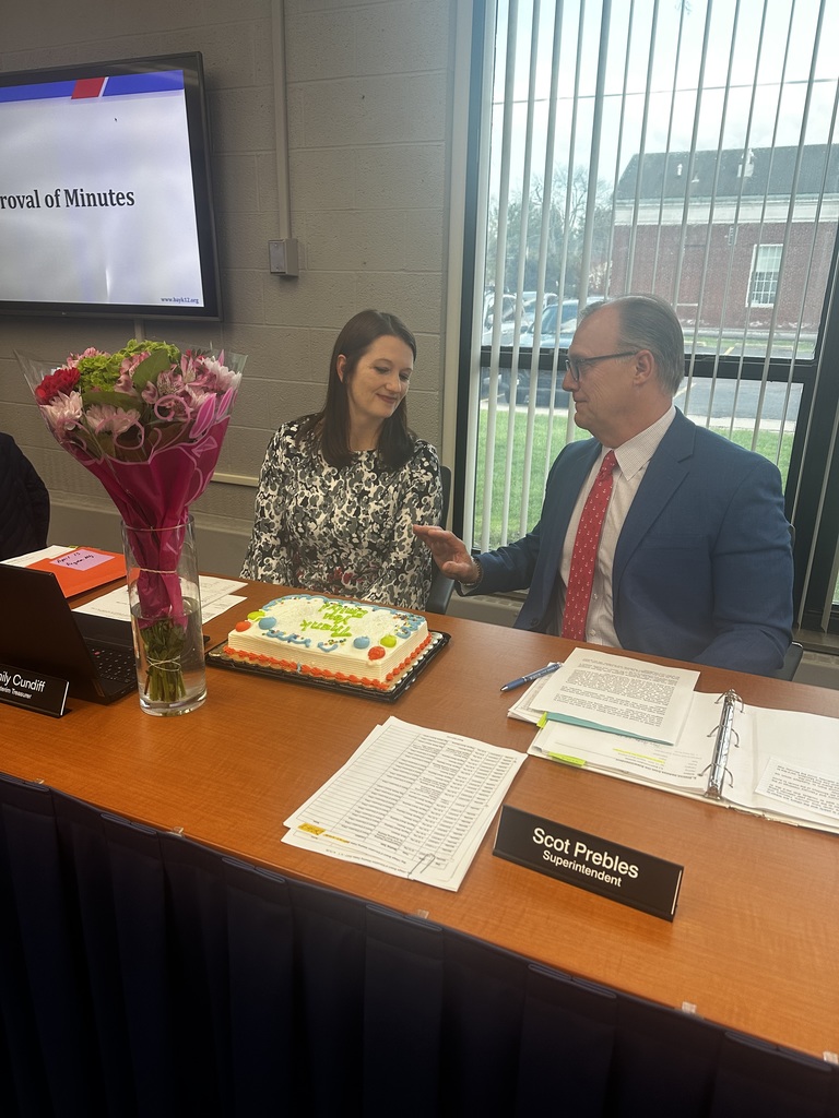 scot prebles, superintendent, thanks interim treasurer emily cundiff for her time at the district photo