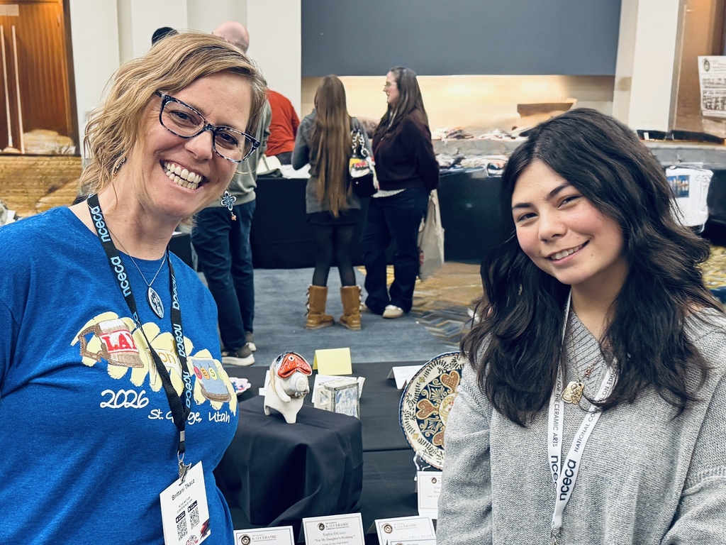 student sophia dicicco and brittani tkacz celebrate sophia's win at the national ceramics education conference photo