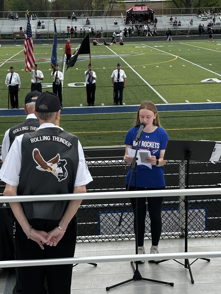 Bay High Senior Abigail Feiszli speaks at Bay Memorial Stadium during the Honor Chair dedication ceremony.