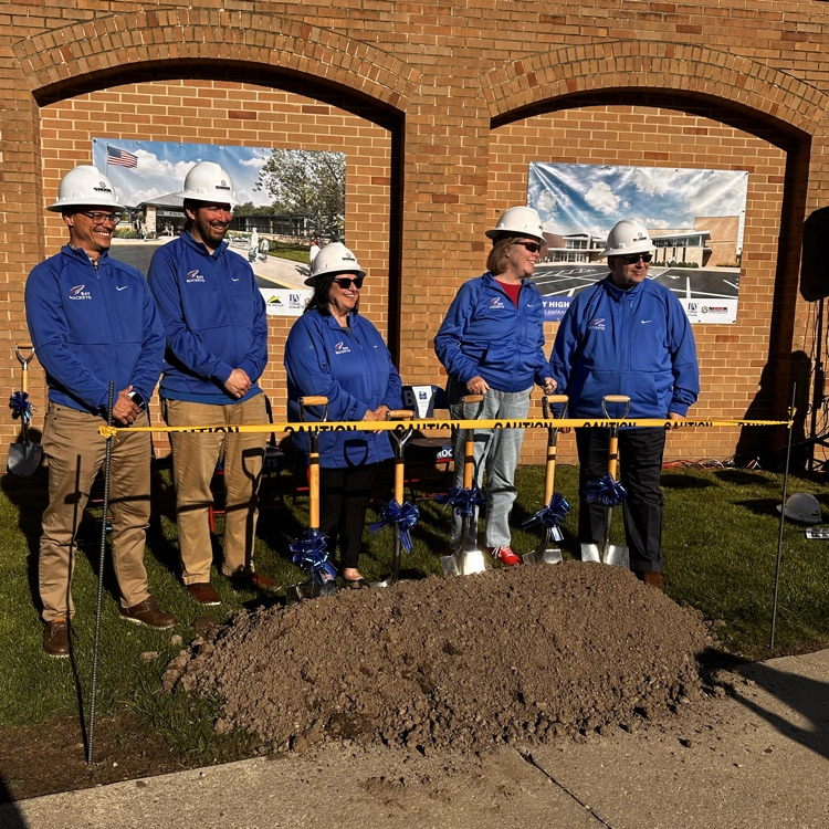 board members with shovels  