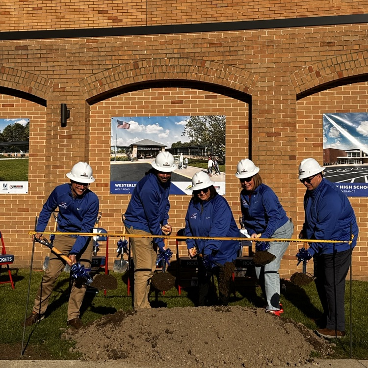 board members with shovels
