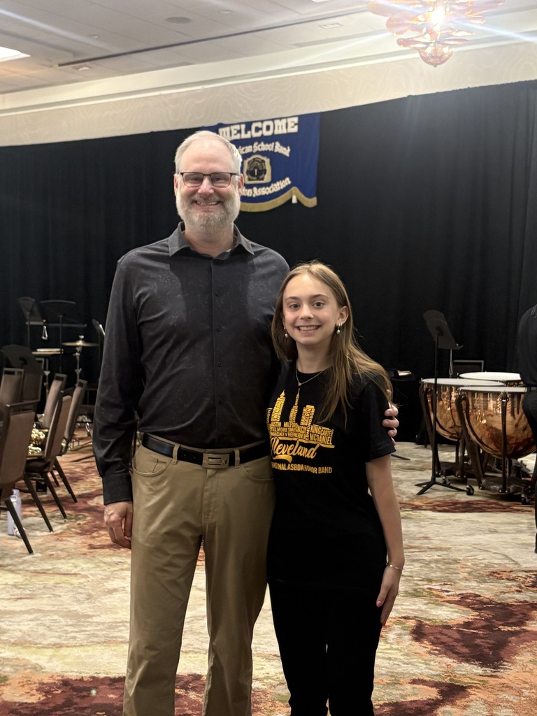 Senior Elisabeth Boggess with Band Director Darren Allen at American School Band Directors Association Honors Band .