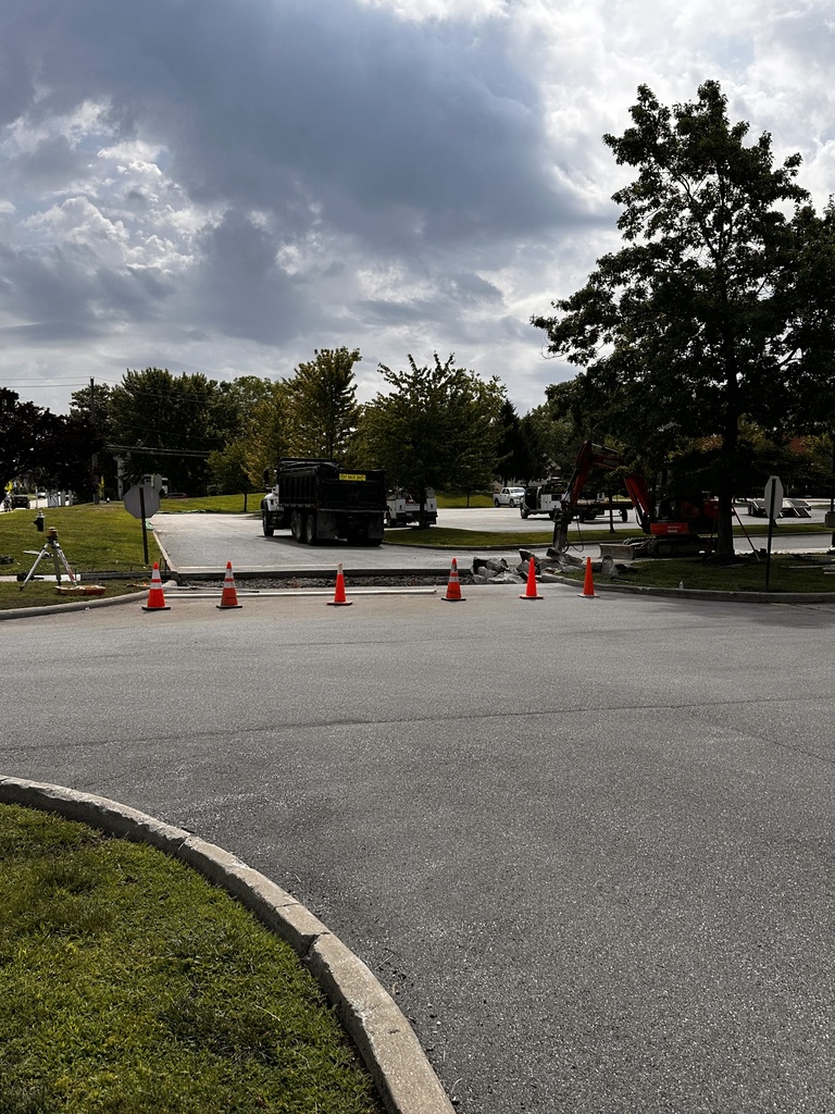 A new crosswalk is being installed at Bay Middle School this summer as seen by the crew creating the new trench in the middle of the parking lot.